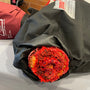 Load image into Gallery viewer, Trauma Kit addition for Multi-Trauma manikins showcasing red and textured material in a black bag.
